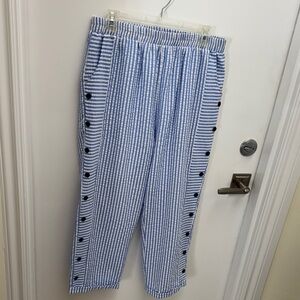 Searsucker pants with button detail, cuffed hem..